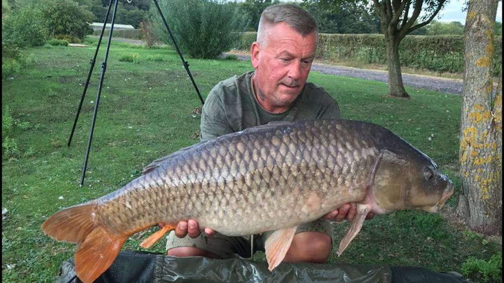 Mick Warren with the Long Common at 31 lb 8 oz