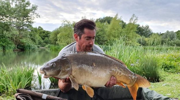 Ross Genders with The Parrot at 31 lb 12 oz